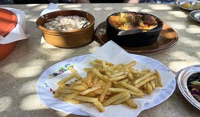 Sharing chicken tagine in Luxor