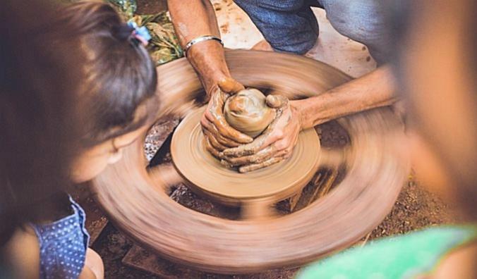 Learning pottery from a local artisan in Egypt
